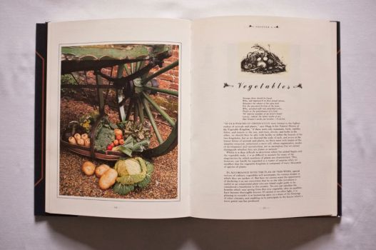At the beginning of Chapter 8 of The Shorter Mrs. Beeton, on Vegetables, a full-page colour photograph displays a green hand cart and a trug with parsnips, leeks, carrots, potatoes, cabbage, lettuce, mushrooms, celery and tomatoes.