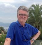 A photograph of Ian Logan, the author of Logomotive