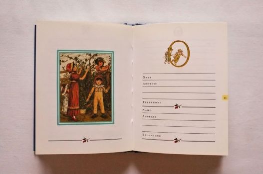 Alongside a colour illustration of children foraging and a header image of children running through the letter O, there is space to write down two names, addresses and telephone numbers.