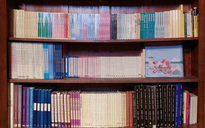 Photograph of Sheldrake Press books on shelves.