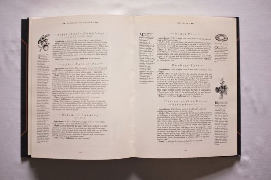On this double-page spread from Chapter 9 of The Shorter Mrs. Beeton are six recipes for tarts and pies, including Baked Apple Dumplings and Bakewell Pudding, with line drawings of quince and rhubarb and an open tart mould.