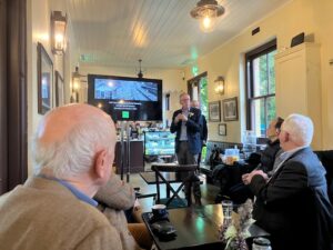 With the aid of a large flat screen, the Executive Director of the Railway Heritage Trust gives a presentation in the Tea Room to Advisory Panel members.