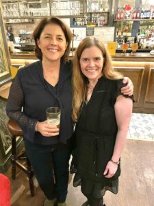 In this colour photograph Cath Harries and Melanie Backe-Hansen share a pint in a pub near the Charing Cross Road in London.