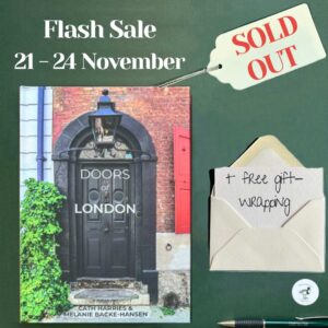 This promotional graphic depicts the cover of the book ‘Doors of London’, on dark green wrapping paper alongside a price tag specifying that the item is SOLD OUT and a card quoting ‘+ free gift-wrapping.’