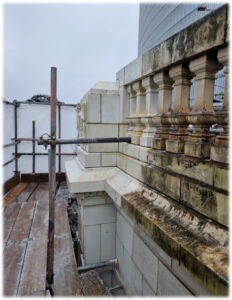Scene behind the hoardings as cleaning reveals the late-1890s faience balustrade at Findlater’s Corner.