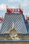 The cast-iron cresting at Peckham Rye station has been painted red and its finials gilded.