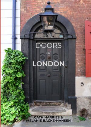 The black front door of Dennis Severs’ House in Spitalfields contrasts boldly with the red brick of the façade and the terracotta of the shutters.