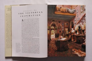 Chapter 1 of The Victorian House Book opens with a full-page colour reproduction of an oil painting of The Hall and Staircase of a Country House by Jonathan Pratt, 1882. The richly patterned carpet, tablecloth and upholstered chairs provide a lavish finish to a High Victorian interior.