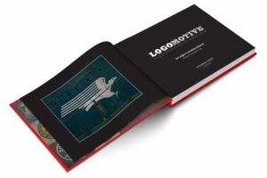 In this colour photograph, the book Logomotive lays open displaying an image of the Missouri Pacific eagle logo.