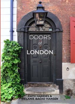 The black front door of Dennis Severs’ House in Spitalfields contrasts boldly with the red brick of the façade and the terracotta of the shutters.