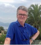 A photograph of Ian Logan, the author of Logomotive