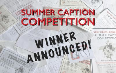 Handwritten letters, postcards and Summer Caption Competition entry forms are laid out across a table.